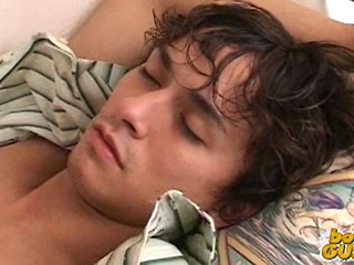 Cute college boy gets undressed while sleeping.